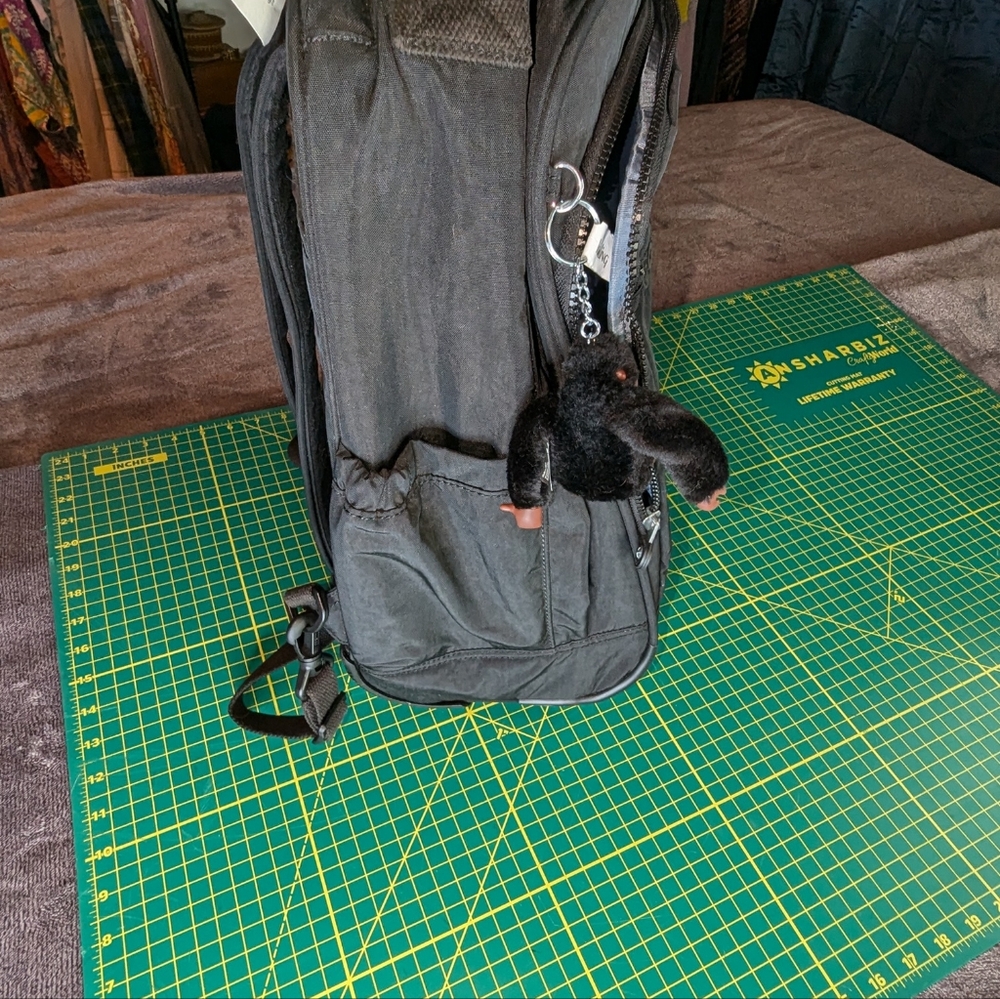 Kipling rolling backpack.